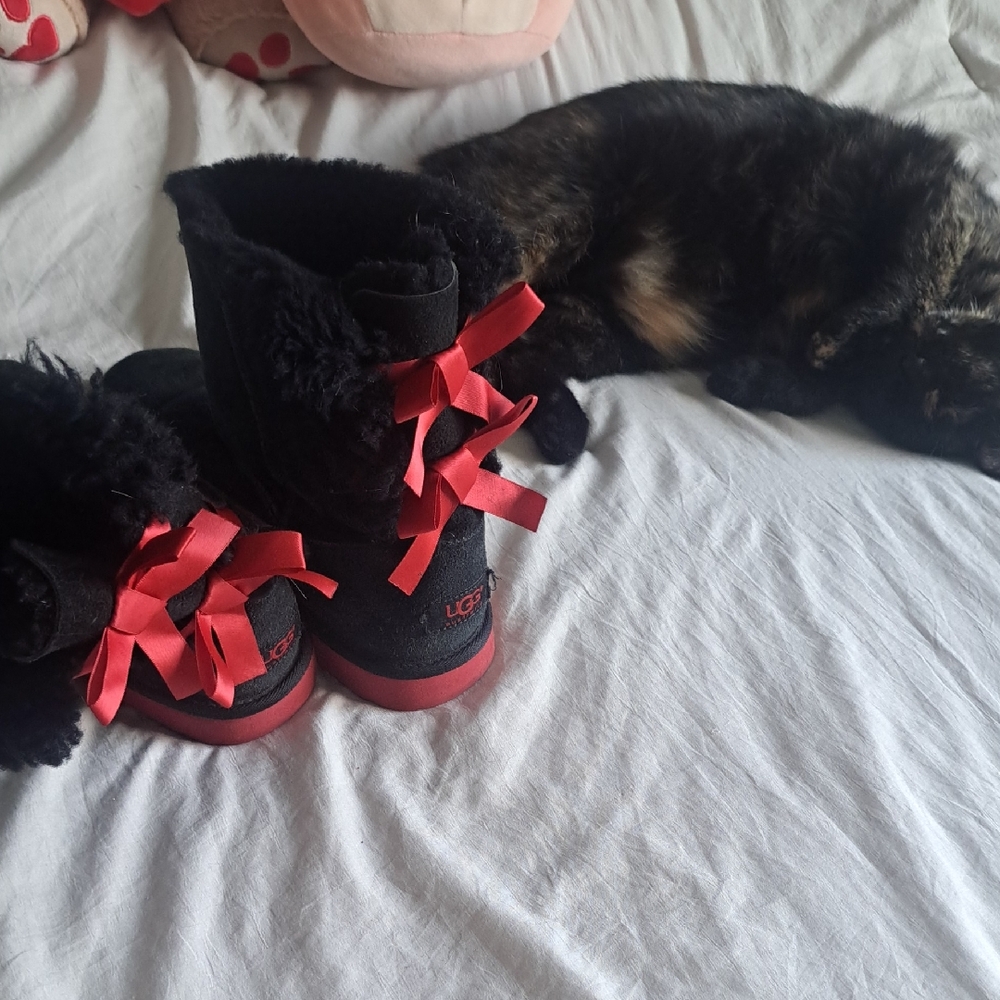 UGG Black Boots with Vibrant Red Accents